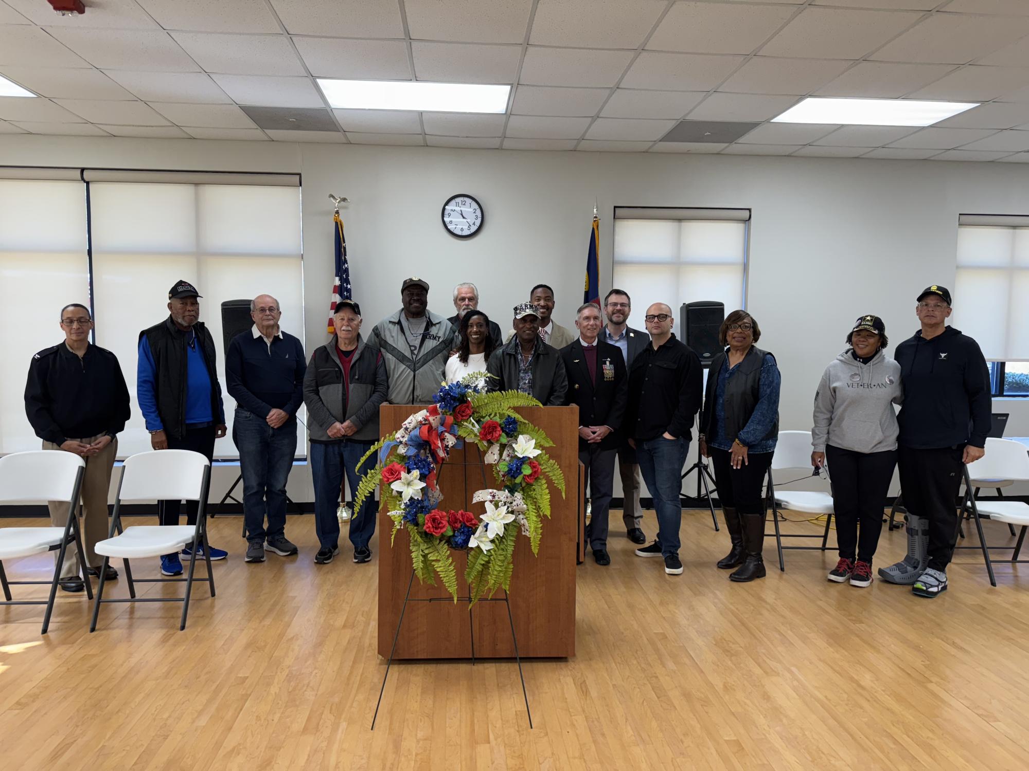Veterans standing together in the Community center