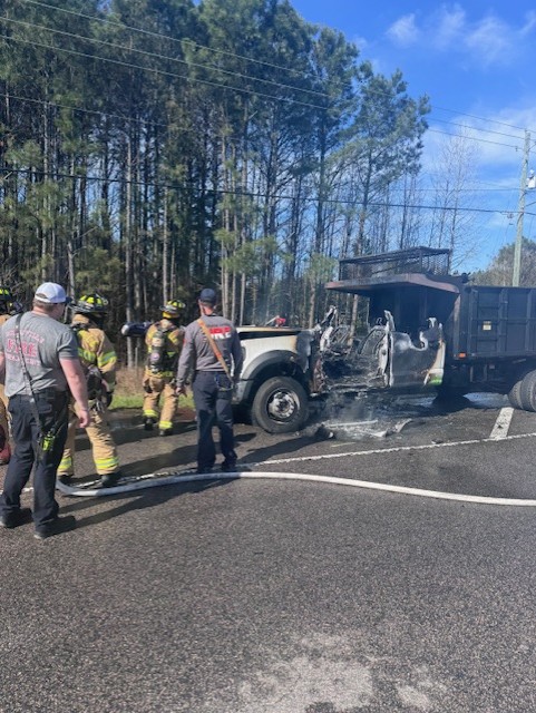 Rolesville Firefighters working with Wendell Firefighters to put out a truck fire. 